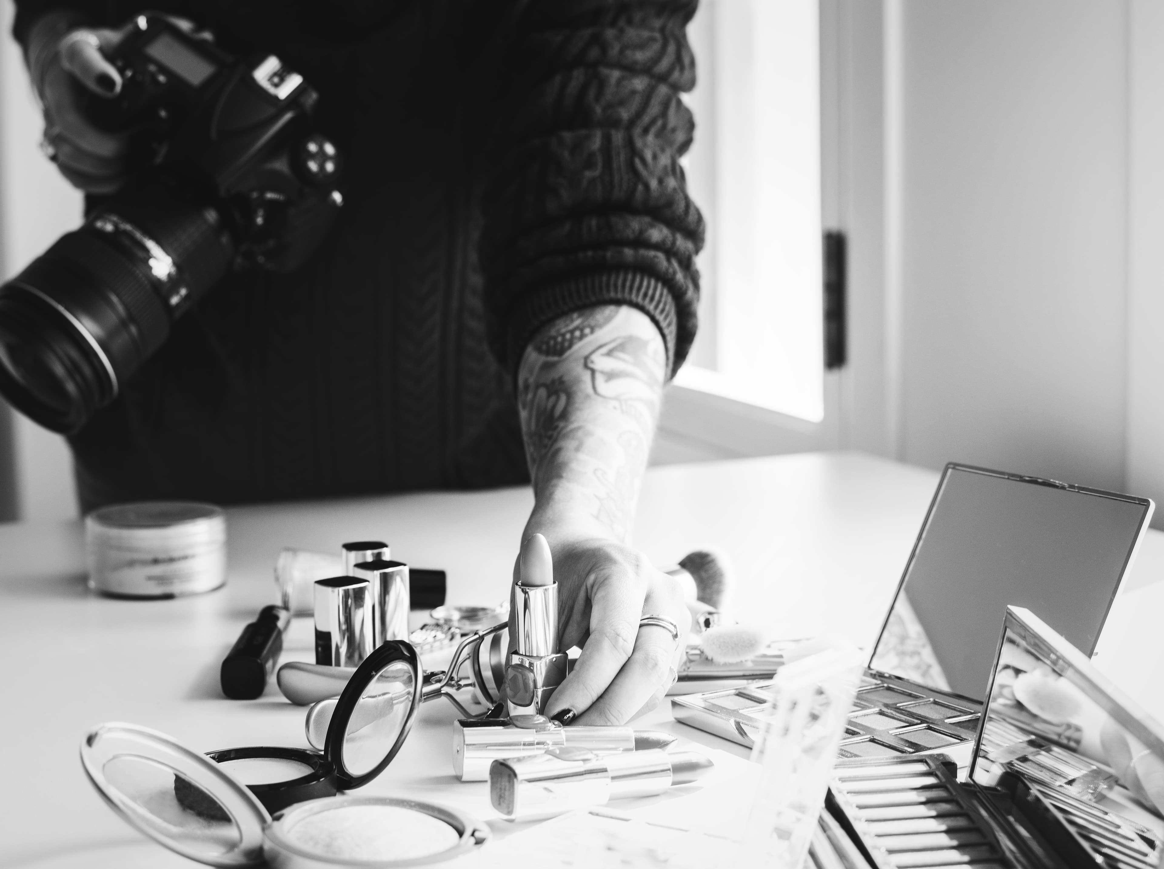 Photographer arranging products for a still-life shoot